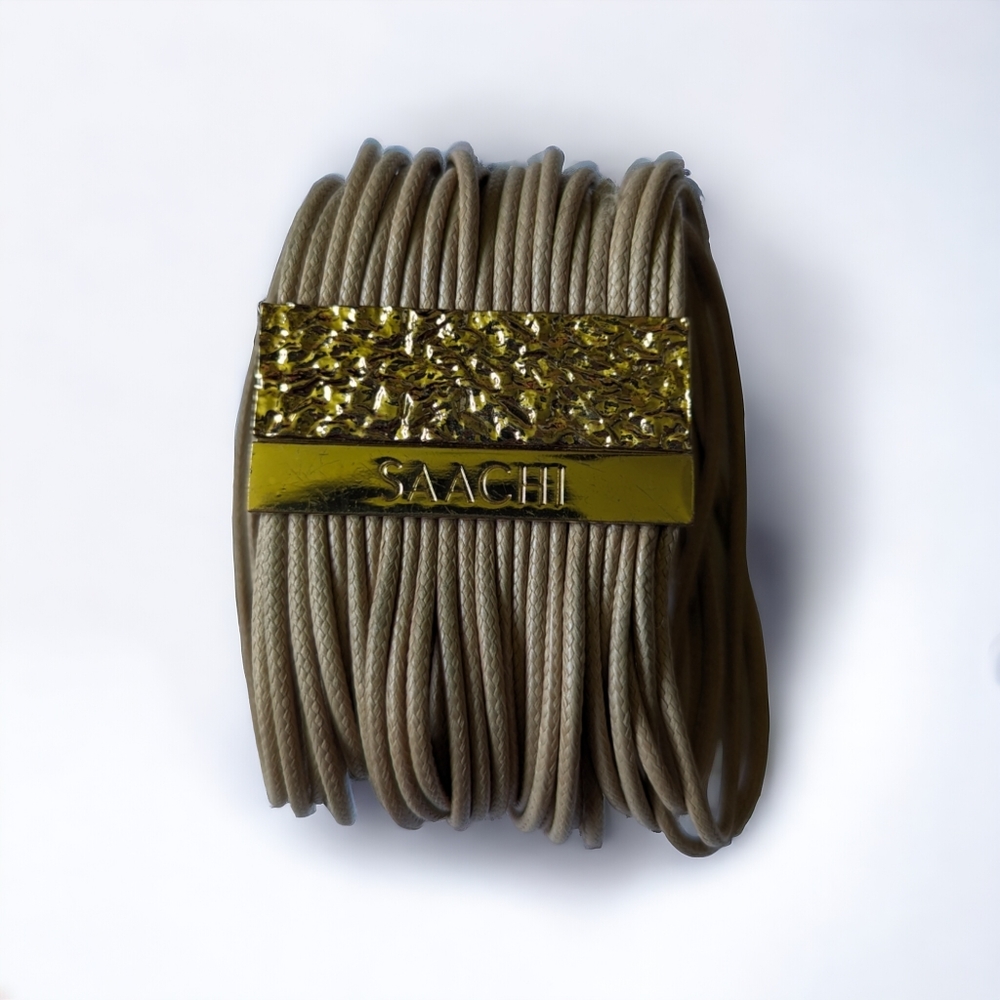 SAACHI • beige leather cord magnetic clasp cuff bracelet